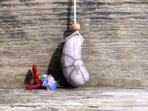 Thumbstone worry pendant w/ sandalwood (pale purple) on eco flax cord