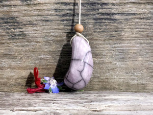 Thumbstone worry pendant w/ sandalwood (pale purple) on eco flax cord