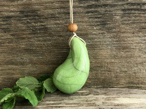 Calming worry pendant w/ sandalwood (light green) in raku ceramic | adjustable eco flax cord | stress talisman, fidget, sensory jewellery