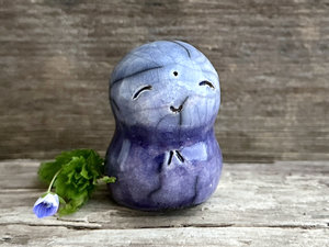 Gentle Jizo hugs guardian statue | Shinto kamidana shrine friend