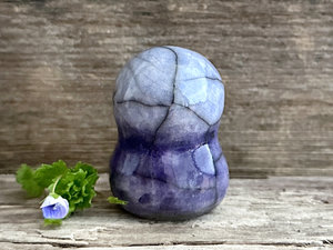 Gentle Jizo hugs guardian statue | Shinto kamidana shrine friend