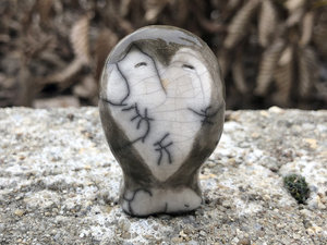 Ceramic raku owl kami nature spirit sculpture with a heart-shaped face. Lovely guardian statue for Shinto kamidana shrine, shamanism, pagan altar, or rewilding.
