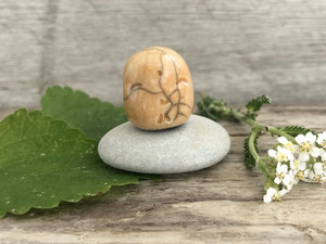 Pocket-sized tiny Jizo ceramic raku Shinto statue sculpture glazed in warm golden yellow with a hint of soft orange. Very smiley, happy, and loving for a shrine or kamidana.