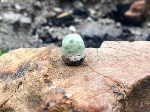 Tiny ceramic sculpture of an earth and rock elemental glazed in white, green, and brown. Lovely for shamanism, Shinto shrine, rewilding, pagan altar.