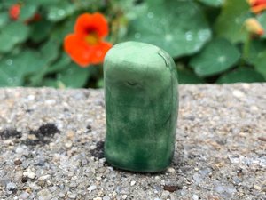 A sweet little kodama nature spirit ceramic guardian statue glazed in shades of green and with a lovely, gentle face. A being of forests and trees, he would be lovely for a Shinto kamidana shrine, pagan altar, Waldorf nature table, or for shamanism.