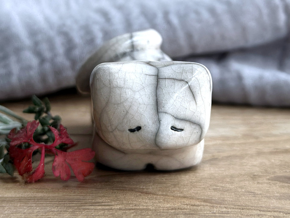 Sleepy white cat kami sculpture | cute guardian for Shinto, shamanism