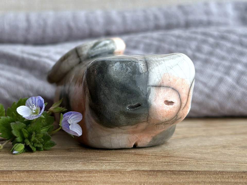 Little raku ceramic cat spirit kami sculpture glazed in a calico pattern (warm orange, grey, and white) and with a kind, gentle face.