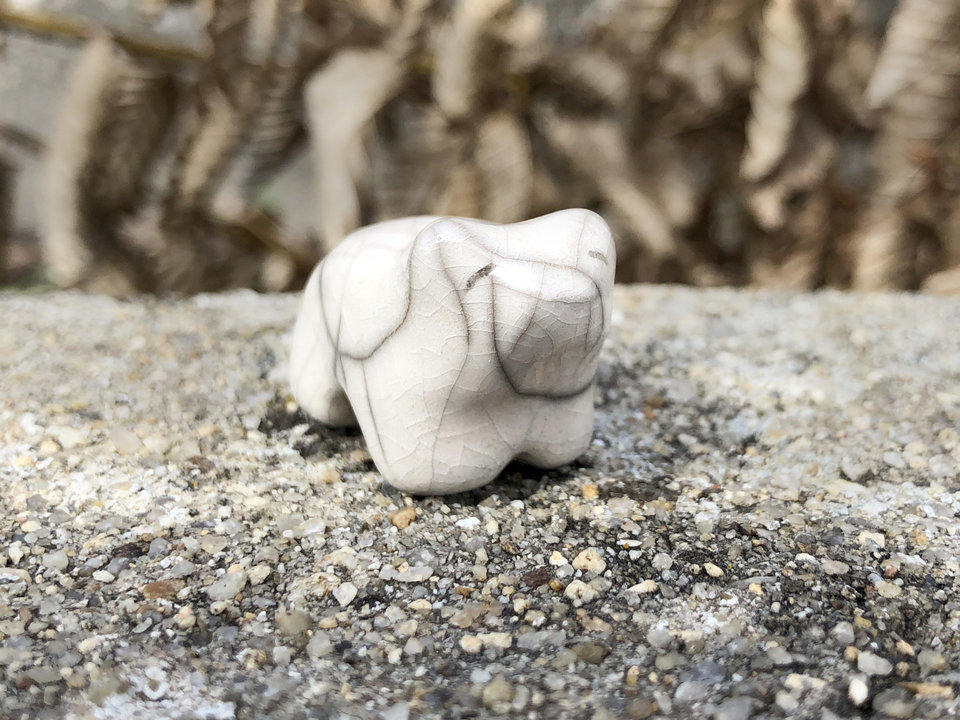 Ceramic raku little white polar bear kami sculpture. He has a kind, gentle face and would be lovely guardian spirit for shamanism or a Shinto kamidana shrine.