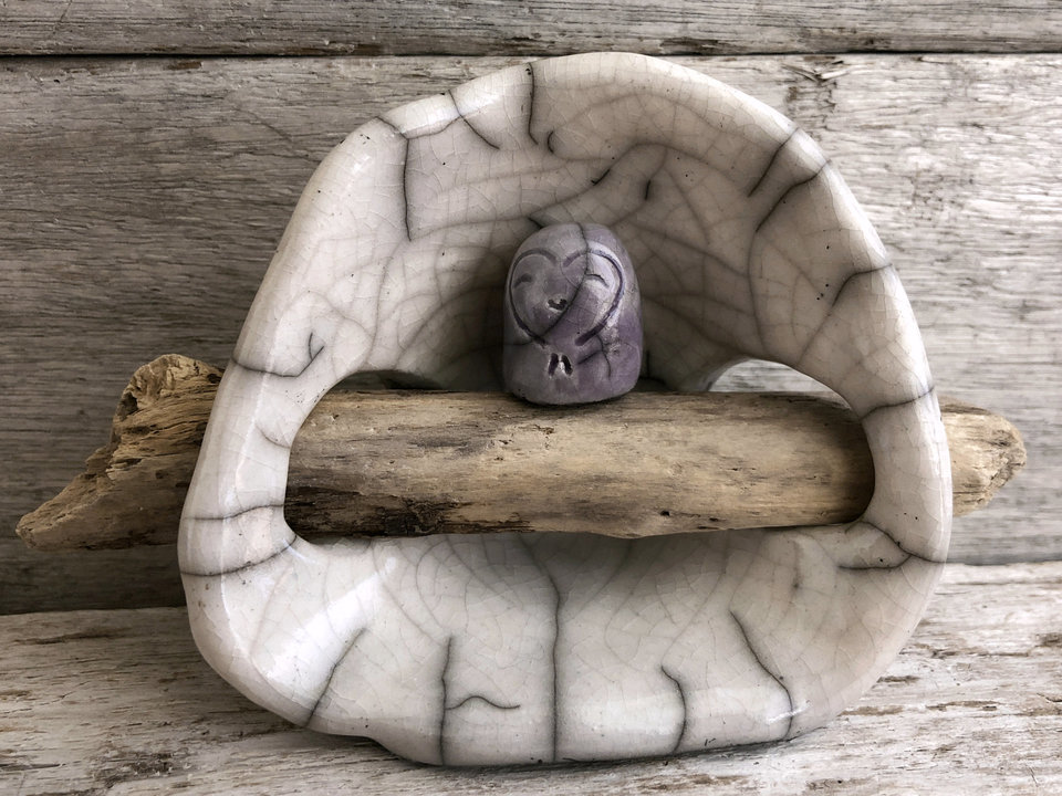 Pocket-sized tiny Jizo ceramic raku Shinto statue sculpture glazed in pale violet with a heart shape around her face and her very own white ceramic and driftwood shrine. Very smiley and happy for kamidana.