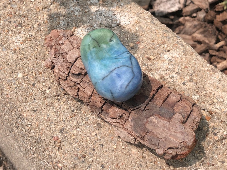 Child of the sea on driftwood, water ocean elemental kami nature spirit | Shinto shrine, Shamanism, pagan raku statue | rewilding healing