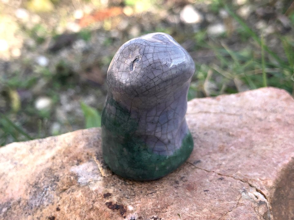 Green and violet ceramic raku sculpture of an elemental nature spirit of life and earth. It looks very sweet, like a little animal, and would be lovely for a Shinto kamidana or shamanism.