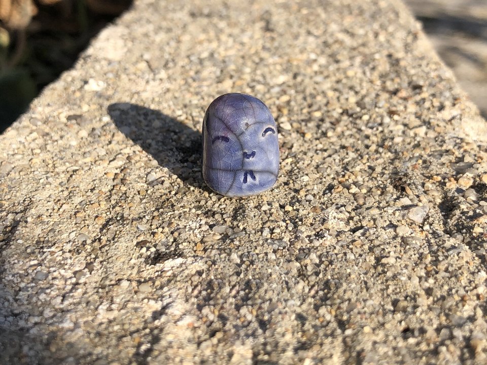 Pocket-sized tiny Jizo ceramic raku Shinto statue sculpture glazed in soft blue and red. Very smiley, happy, and loving for a shrine or kamidana.