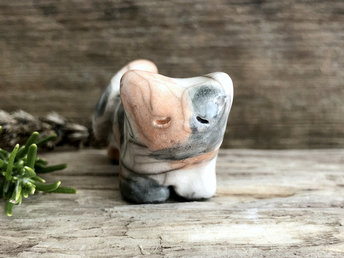 Little raku ceramic cat spirit kami sculpture glazed in a calico pattern (orange, grey, and white) and with a kind, gentle face.