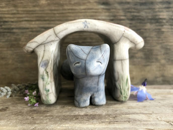 Small blue and brown raku ceramic Shinto Inari kitsune fox kami sculpture with his very own little ceramic house. The house is glazed to look like it has a terracotta tiled roof and coloured carvings of tree and flowers on its white walls. A perfect mini shrine. 