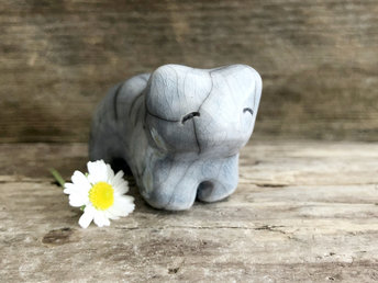 Ceramic raku bear kami sculpture glazed in pale grey-blue. He has a kind, gentle face.