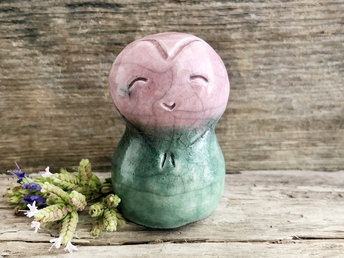 A smiley, loving, and very happy Jizo Shinto raku ceramic sculpture talisman glazed in a bottom-to-top gradient of forest green to rose pink. A wonderful, smooth shape to hold in the hand.