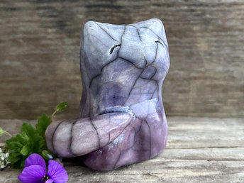 A calm and gentle Shinto Inari nighttime moon kitsune fox kami spirit ceramic raku statue glazed in a bottom-to-top gradient of purple to soft indigo.