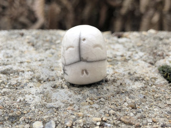 Pocket-sized tiny Jizo ceramic raku Shinto statue sculpture glazed in white. Very smiley, happy, and loving for a shrine or kamidana.