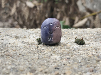 Pocket-sized tiny Jizo ceramic raku Shinto statue sculpture in purple and violet. Very smiley, happy, and loving for a shrine or kamidana.