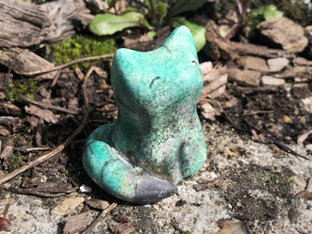 Ceramic raku Shinto Inari kitsune fox kami sculpture glazed in copper-turquoise with a black tail. Friendly nature guardian spirit for kamidana shrine, shamanism, animal totem guide.