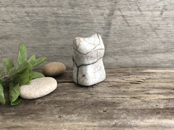 Small ceramic raku kitten sculpture glazed in white with pale pink ears. This cat kami statue can be carried gently in a soft pocket as an animal totem guide or just as a friend.