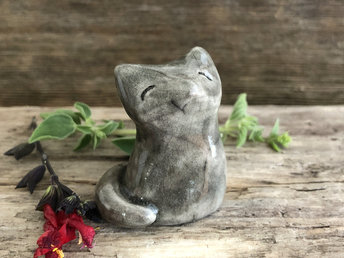 A sweet and happy Shinto Inari sitting kitsune fox kami spirit ceramic raku statue glazed in grey.