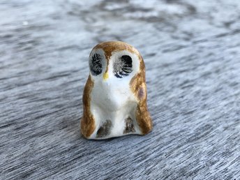 Ceramic owl nature spirit guardian kami sculpture glazed in white and brown fingerprint patterns. Very special statue for Shinto, shamanism, pagan: totem animal guide.