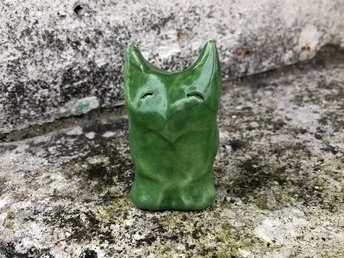 Ceramic raku earth elemental kami nature spirit sculpture glazed in green. She has pointed ears and a sweet, kind face, lovely for a Shinto shrine, shamanism, or rewilding.
