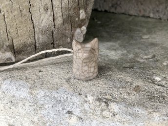 Raku ceramic Shinto Inari kitsune fox pendant glazed in light brown with amazing raku crackling. This fox nature spirit kami necklace is strung on adjustable eco-hemp cord. 