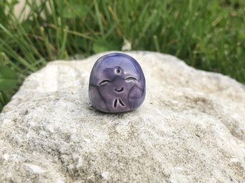 Pocket-sized tiny Jizo ceramic raku Shinto statue sculpture glazed in violet. Very smiley, happy, and loving for a shrine or kamidana.