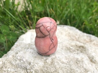 A smiley, loving, and very happy Jizo Shinto raku ceramic sculpture talisman in soft peach-pink. A wonderful smooth shape to hold in the hand.