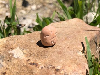 Pocket-sized tiny Jizo ceramic raku Shinto statue sculpture glazed in pale orange. Very smiley, happy, and loving for kamidana shrine.