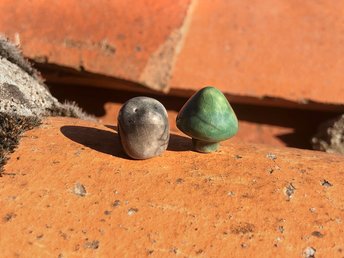 Two very small raku ceramic sculptures: a green tree and a brown hedgehog. They are very sweet and would be lovely nature spirits for Shinto or shamanism or for a nature table.