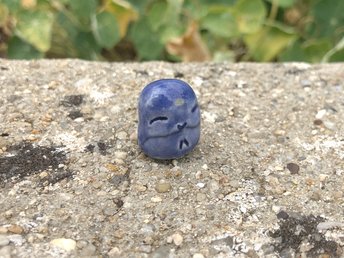 Pocket-sized tiny Jizo ceramic raku Shinto statue sculpture glazed in blue with a yellow dot over his third eye.