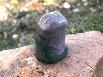 Green and violet ceramic raku sculpture of an elemental nature spirit of life and earth. It looks very sweet, like a little animal, and would be lovely for a Shinto kamidana or shamanism.