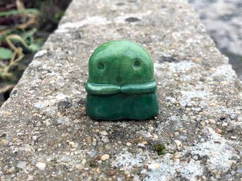 A sweet little kodama nature spirit ceramic guardian statue glazed in shades of green and with a lovely, gentle face and little arms. A being of forests, he would be lovely for a Shinto kamidana shrine, pagan altar, nature table, or shamanism.
