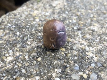 Pocket-sized tiny Jizo ceramic raku Shinto statue sculpture in brown and violet. Very smiley, happy, and loving for a shrine or kamidana.